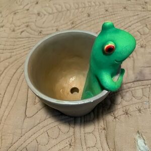 Small Ceramic Planter With a Whimsical Frog Perched on The Rim